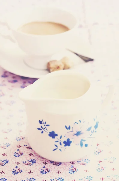 Vintage milk jug, table served for morning coffee — Stock Photo, Image