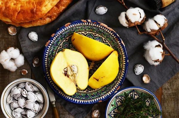 Quince in pattern ceramic bowl in oriental style — Stock Photo, Image