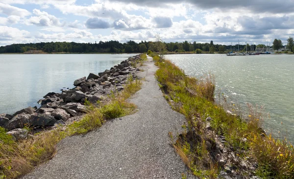 Breakwater, path and sea — Stock Photo, Image