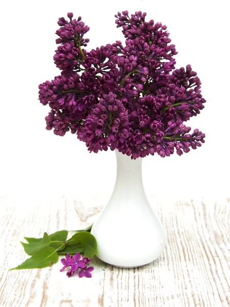 Summer lilac flowers in vase — Stock Photo, Image