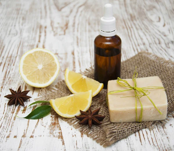 Handmade lemon soap and essential oil — Stock Photo, Image