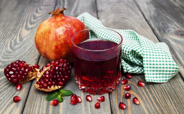 Glass of pomegranate juice — Stock Photo, Image