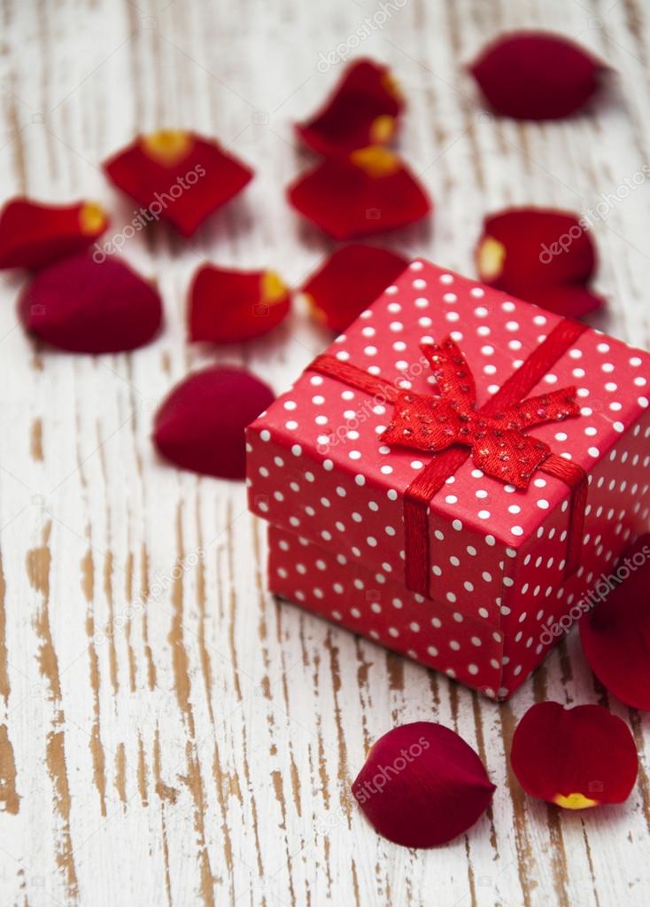 gift box and roses petals