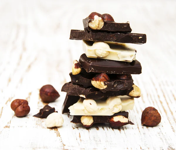 Dark and white chocolate with nuts — Stock Photo, Image