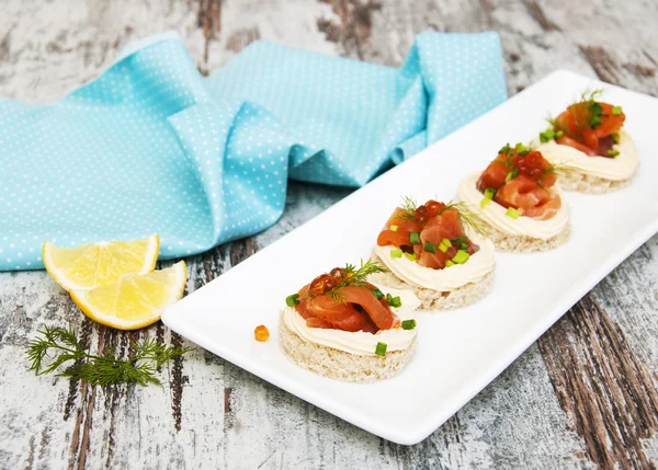 Canape with salmon and dill — Stock Photo, Image