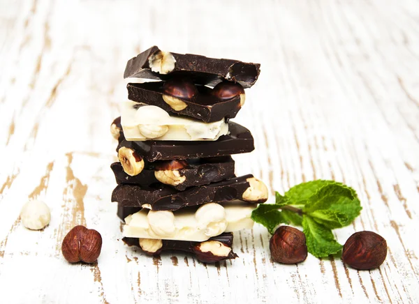 Dark and white chocolate with nuts — Stock Photo, Image