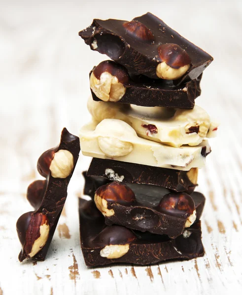 Dark and white chocolate with nuts — Stock Photo, Image