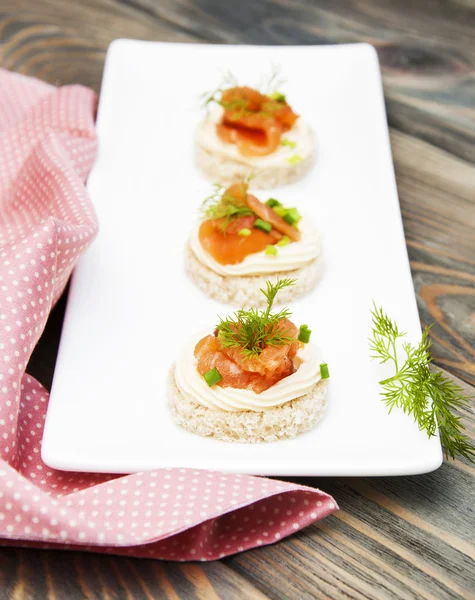 Canape with salmon — Stock Photo, Image