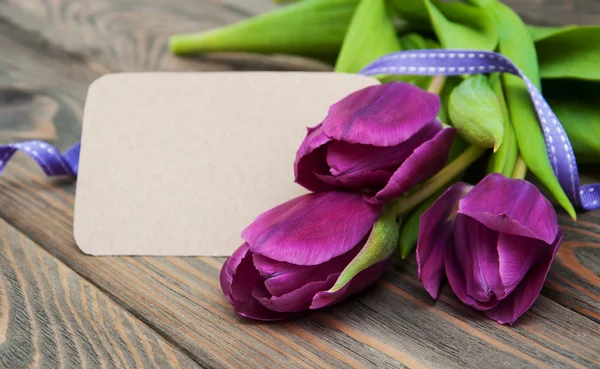 Tulips with a card — Stock Photo, Image