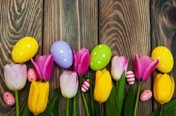 Colorful tulips and easter eggs — Stock Photo, Image