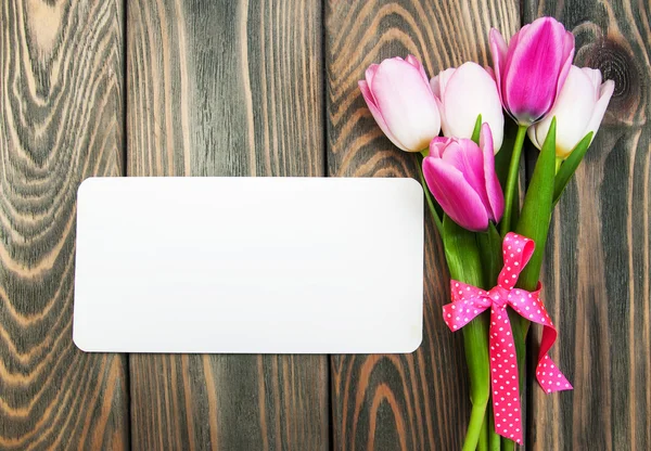 Tulips with a card — Stock Photo, Image