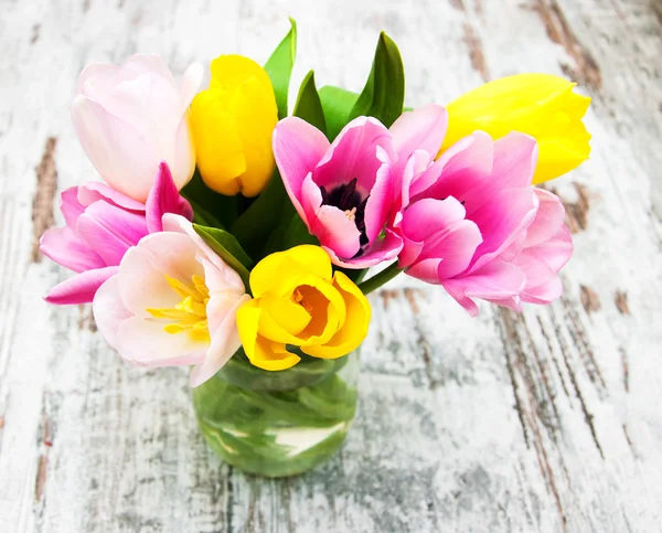 Vase with colorful tulips — Stock Photo, Image