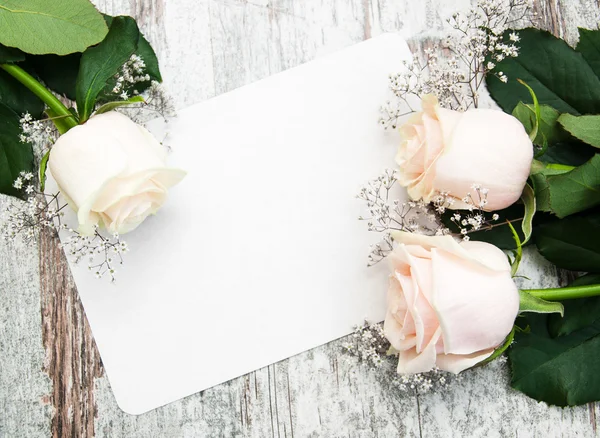 Roses with a card — Stock Photo, Image