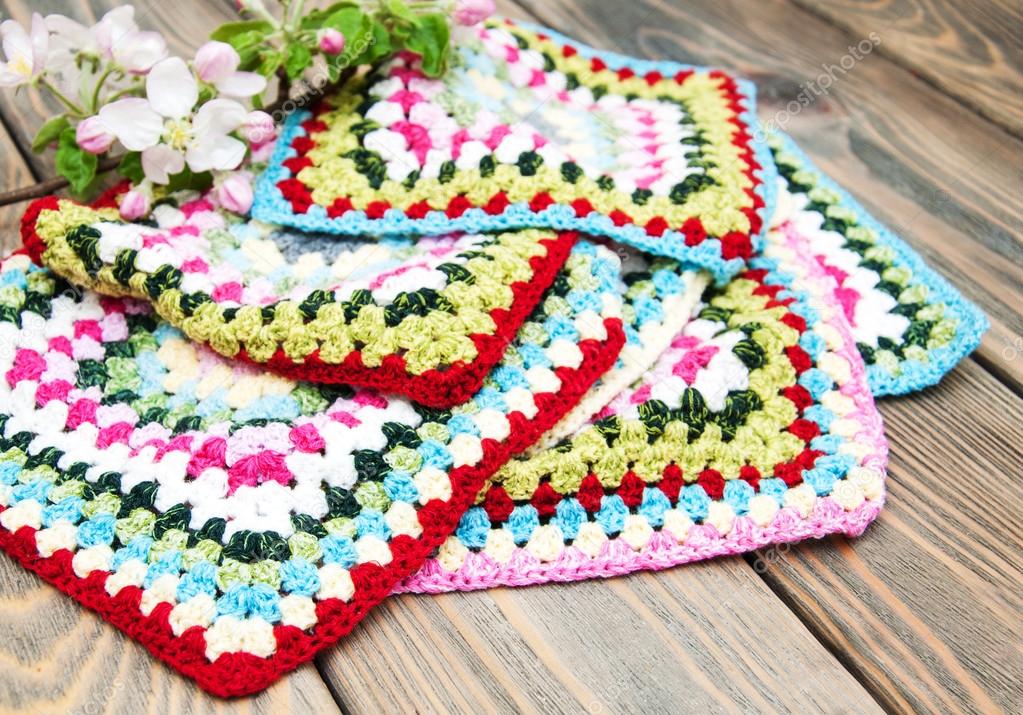 multicolored plaid squares of crocheted