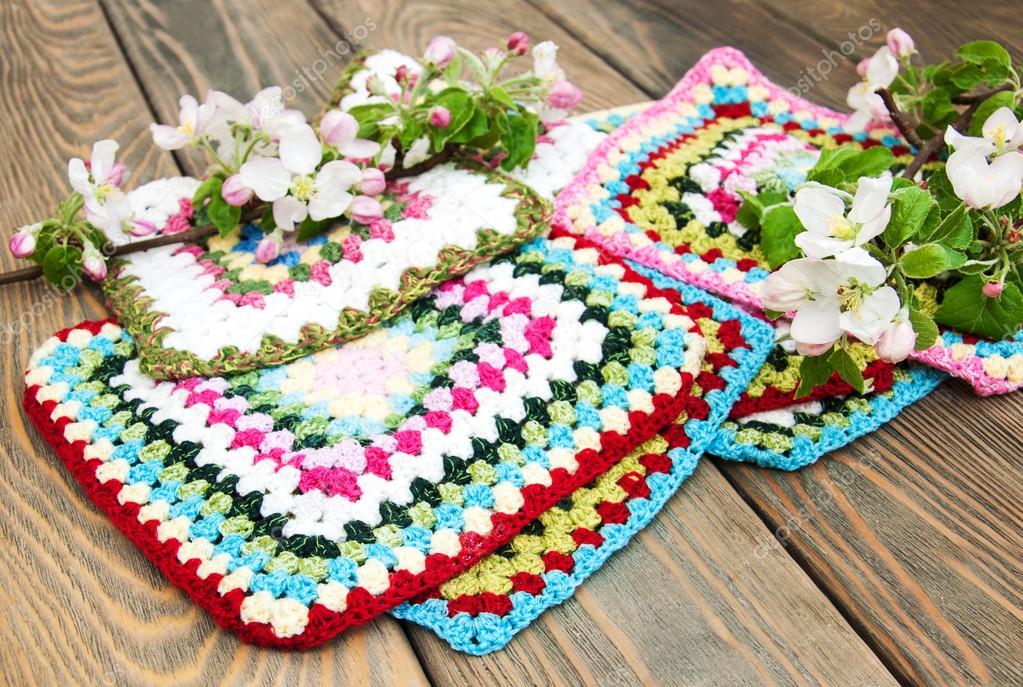 multicolored plaid squares of crocheted