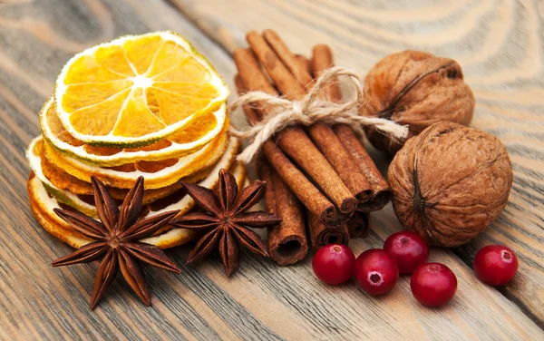 Spices and dried oranges — Stock Photo, Image