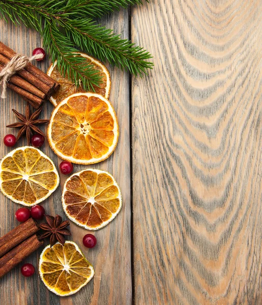 Spices and dried oranges — Stock Photo, Image