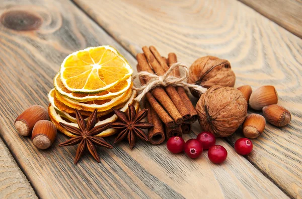 Spices and dried oranges — Stock Photo, Image