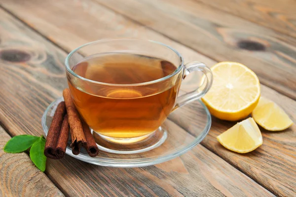 Cup of tea with  cinnamon — Stock Photo, Image