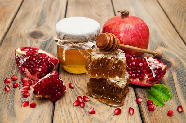 Honey with pomegranate — Stock Photo, Image