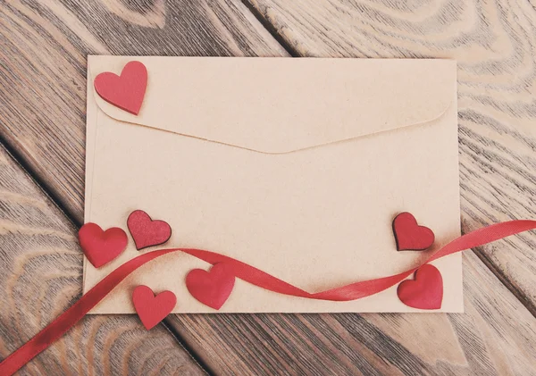 Envelope with hearts- vintage toning Royalty Free Stock Photos