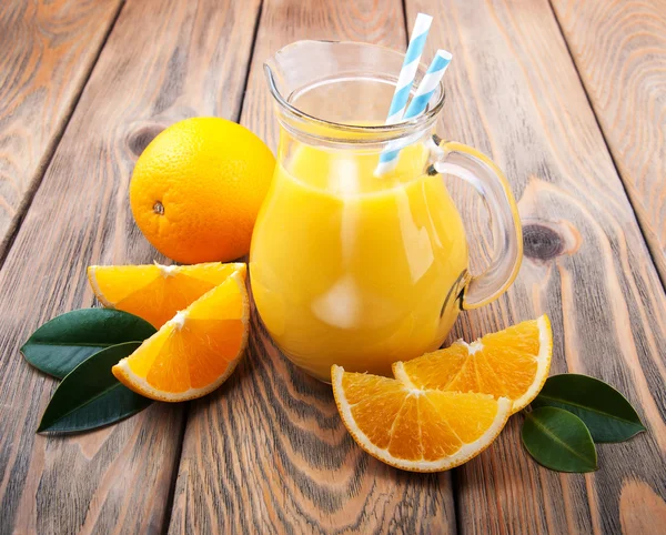 Jug with orange juice — Stock Photo, Image