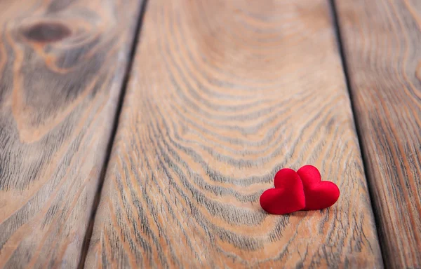 Coeurs sur un fond en bois — Photo