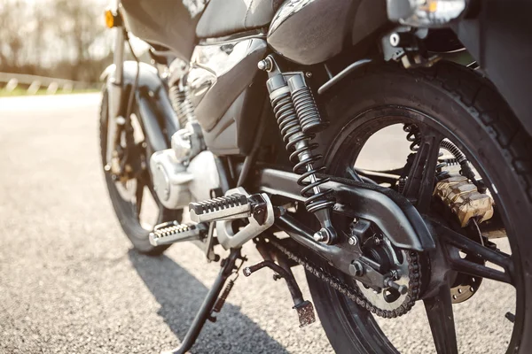 Amortyzator i łańcuch czarny motocykl — Zdjęcie stockowe