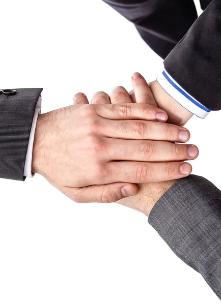 Equipe de negócios mostrando unidade com as mãos juntas — Fotografia de Stock