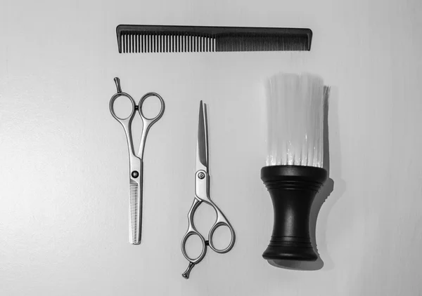 Hairdressing equipment over a white wooden background — Stock Photo, Image