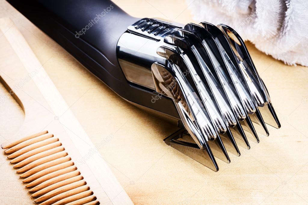 hair clipper and wooden comb