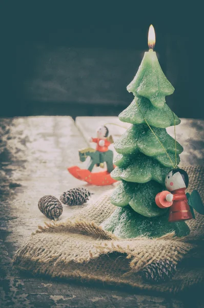 Christmas tree candle in retro setting — Stock Photo, Image