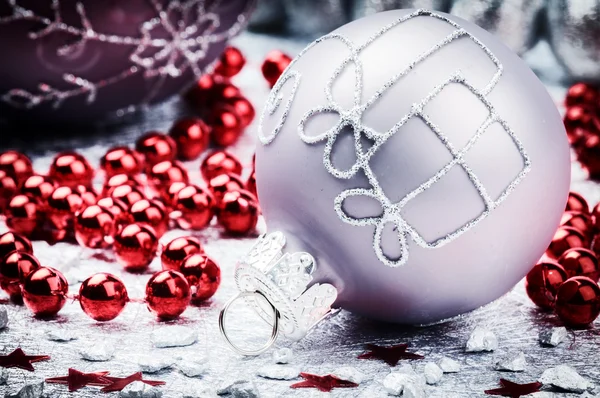 Christmas ornaments in festive setting — Stock Photo, Image