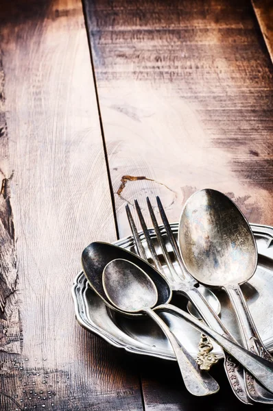 Vintage cutlery on wooden table — Stock Photo, Image