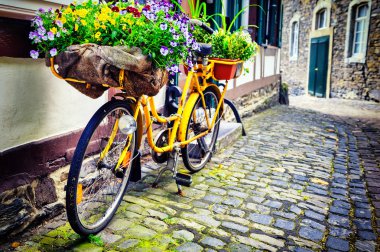 Old rusty bicycle with flowers clipart