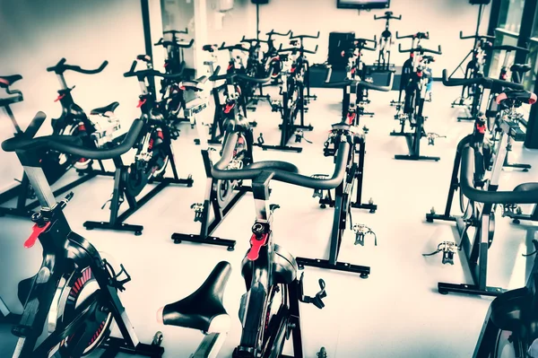 Spinning class with empty bikes — Stock Photo, Image