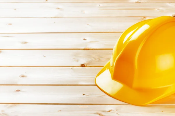 Yellow hard hat with copy space — Stock Photo, Image