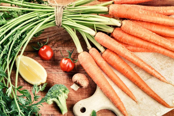 Carrots bunch in cooking setting — Stock Photo, Image