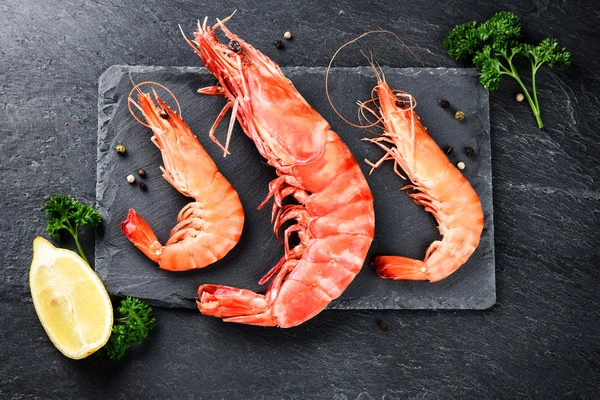 jumbo shrimps for dinner on stone plate