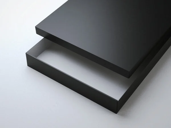Opened black cardboard package — Stock Photo, Image