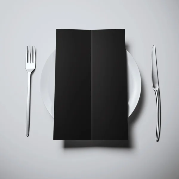 Plate with blank black dinner menu — Stock Photo, Image