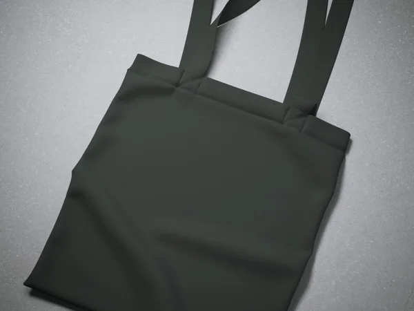 Sac textile en coton noir sur un sol gris — Photo