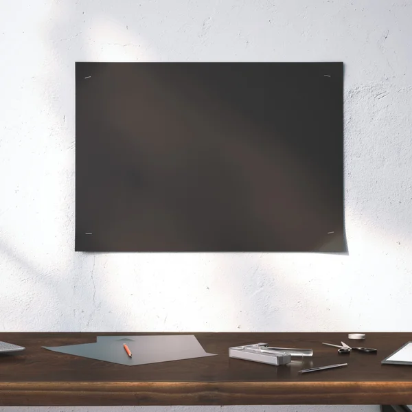 Black poster on the wall. Table with stapler. 3d rendering — Stock Photo, Image