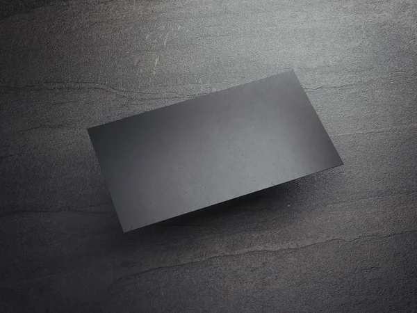 Black business card on the stone floor. 3d rendering — Stock Photo, Image