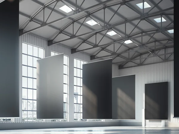 Carteles negros en blanco en la zona del hangar. renderizado 3d — Foto de Stock