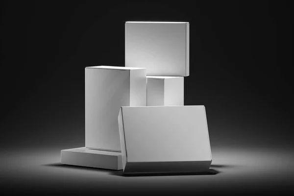 Zestaw białych pustych pudełek wykonanych z tektury podświetlanej plamką na czarnym tle. 3d Renderowanie — Zdjęcie stockowe