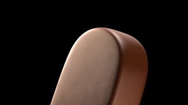 Çubukta güzel çikolatalı dondurma. Yavaş çekim döndürmesi.