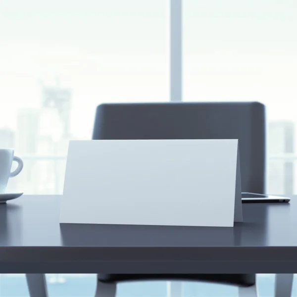 Blank paper card on office table — Stock Photo, Image