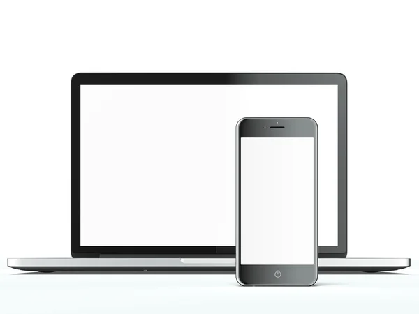 Black laptop and mobile phone with a blank screen — Stock Photo, Image