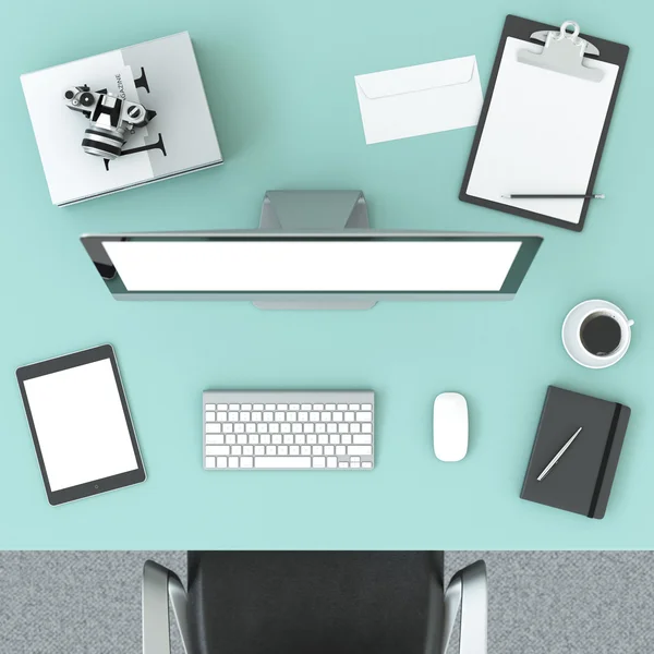 Green table with a computer — Stock Photo, Image